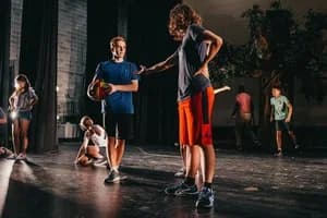 Everyday Charlie rehearsal scene with a basketball